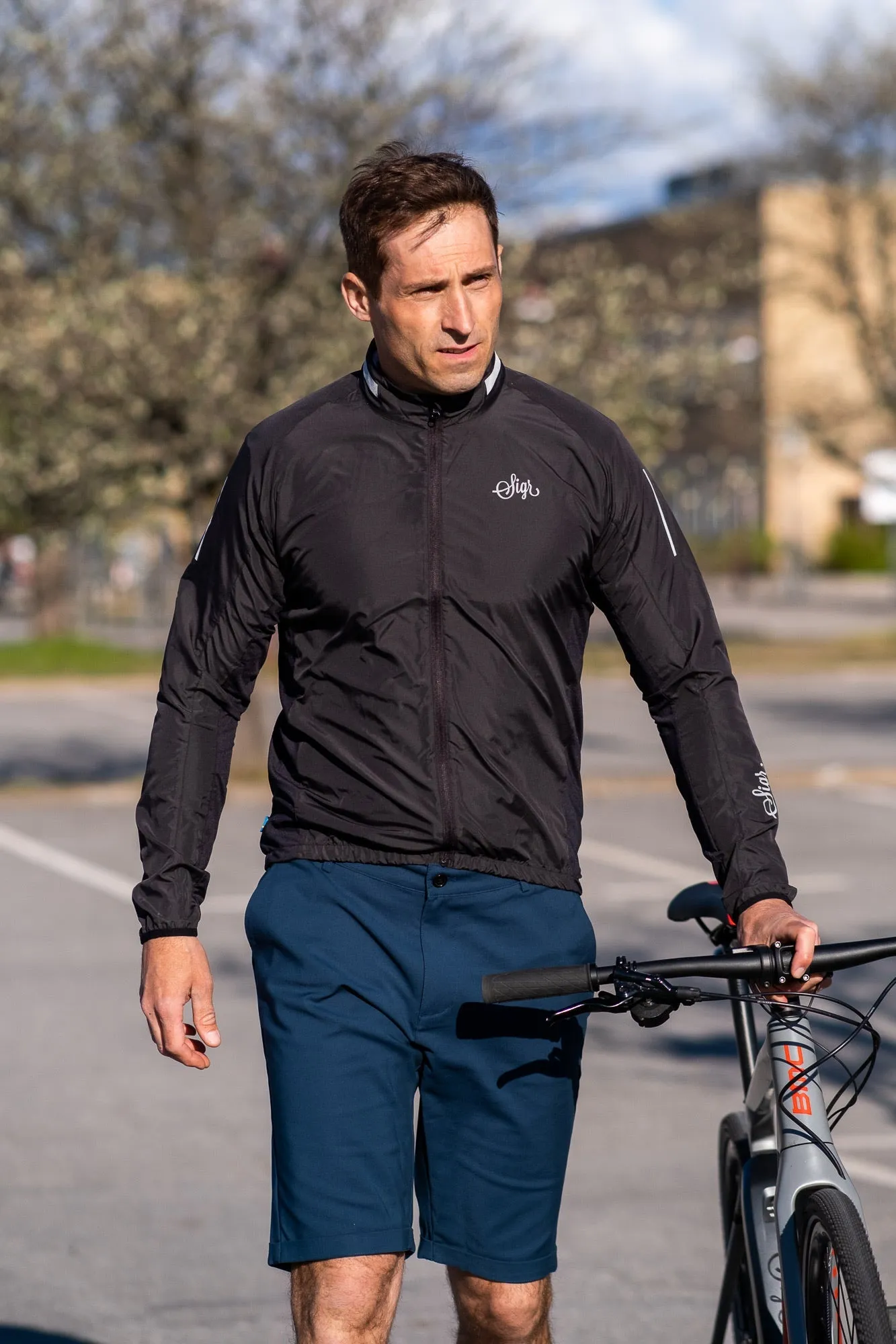 Treriksröset Black Men's Cycling Wind/Pack Jacket