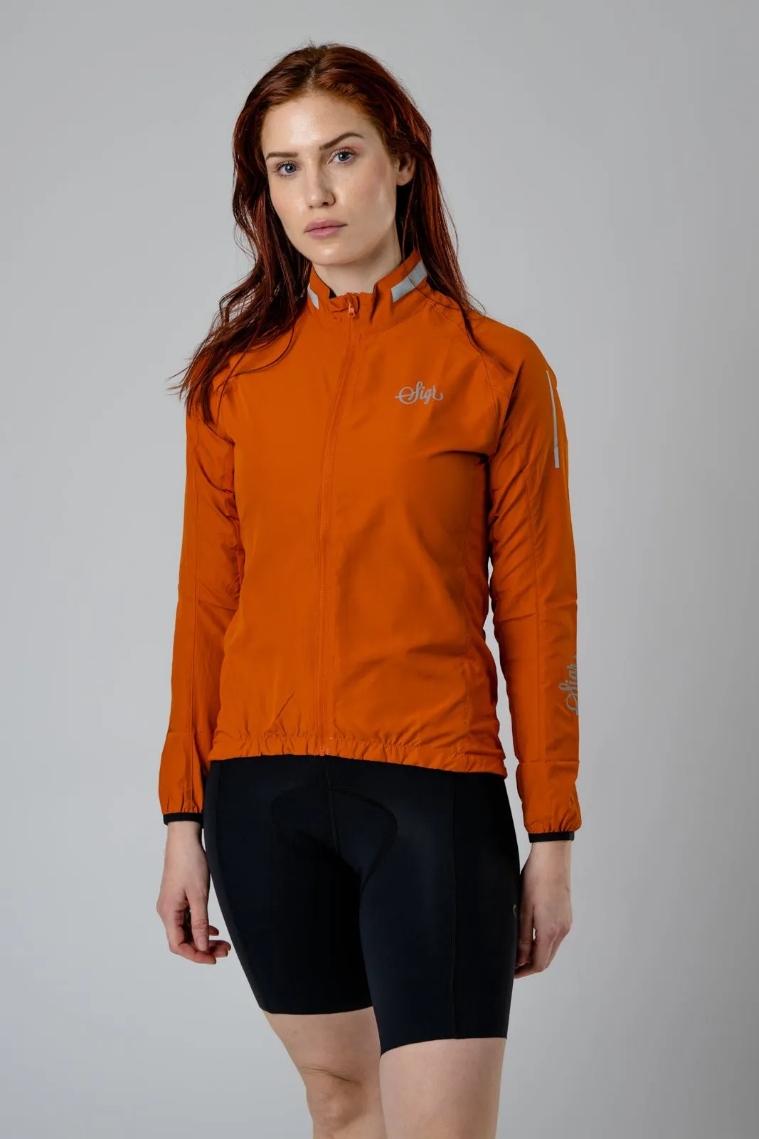 Treriksröset Orange Women's Cycling Wind/Pack Jacket