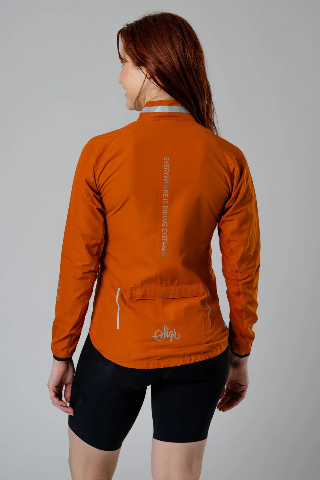 Treriksröset Orange Women's Cycling Wind/Pack Jacket